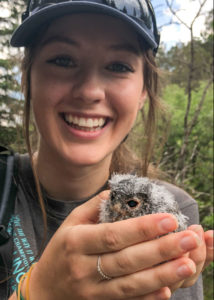 CSU student holding an owl