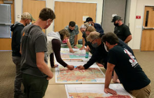 Land and fire managers and community stakeholders in Boulder County huddled around CFRI geospatial mapping products aided by CFRI’s science and outreach staff. Photo by Tony Cheng.