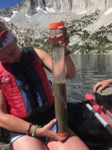 Charlton with a lake sediment core taken from Ruby Lake in Inyo National Forest, California.
