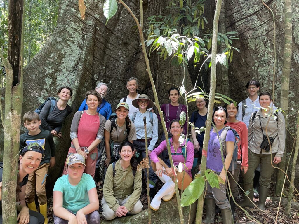 A group of root ecologists stand in a tropical rainforest in Panama.